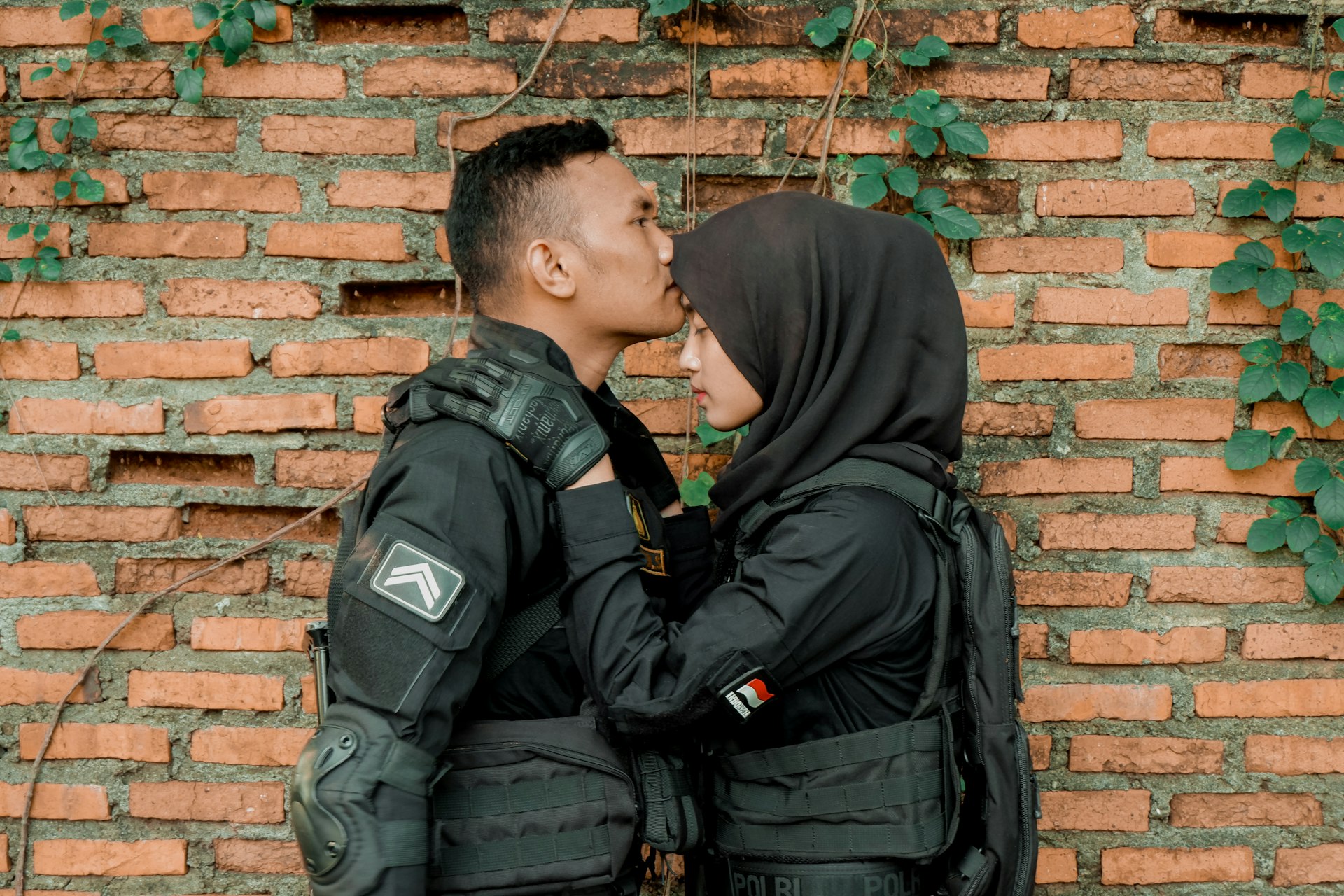 a man and woman kissing